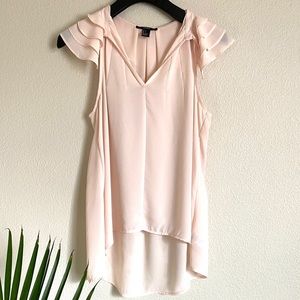Soft pink sleeveless blouse